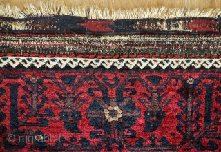 Baluch Rug, possibly Kashmar area Khorasan, Mid to 3rd quarter of the 19th Century.  Very dark brooding tones of blue and deep rich red.  Birds interspersed throughout the mina khani  ...
