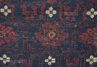 Baluch Rug, possibly Kashmar area Khorasan, Mid to 3rd quarter of the 19th Century.  Very dark brooding tones of blue and deep rich red.  Birds interspersed throughout the mina khani  ...