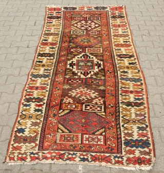 Sauj Bulak rug, 19th century.  A collection of medallions in the field.  Beautiful "crab" border.  109 x 280 cm  Contact danauger@tribalgardenrugs.com        