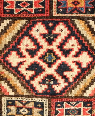 Sauj Bulak rug, 19th century.  A collection of medallions in the field.  Beautiful "crab" border.  109 x 280 cm  Contact danauger@tribalgardenrugs.com        
