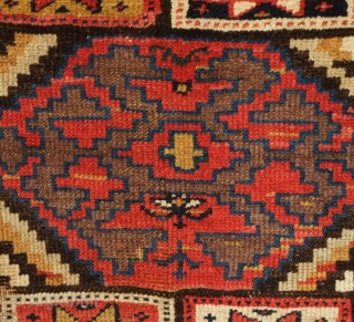 Sauj Bulak rug, 19th century.  A collection of medallions in the field.  Beautiful "crab" border.  109 x 280 cm  Contact danauger@tribalgardenrugs.com        