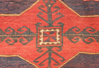 Kazak rug, late 19th century.  Deeply saturated colors with fluidly drawn serrated decagons. The organic quality of these medallions and other design elements almost gives this rug the feel of a  ...