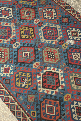 Shirvan kilim, 19th century.  Smaller format.  Paper thin weave.  Animal figures in soumak weave throughout the bottom half of the kilim. It has a couple of holes but otherwise  ...