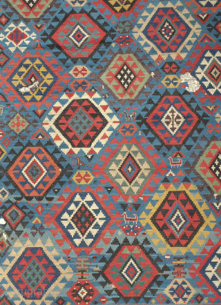 Shirvan kilim, 19th century.  Smaller format.  Paper thin weave.  Animal figures in soumak weave throughout the bottom half of the kilim. It has a couple of holes but otherwise  ...