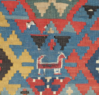 Shirvan kilim, 19th century.  Smaller format.  Paper thin weave.  Animal figures in soumak weave throughout the bottom half of the kilim. It has a couple of holes but otherwise  ...
