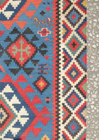 Shirvan kilim, 19th century in smaller format.  Rare border type. Paper thin weave. Animal figures in soumak weave throughout the bottom half of the kilim. It has a couple of holes  ...