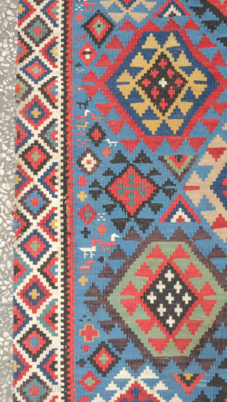 Shirvan kilim, 19th century in smaller format.  Rare border type. Paper thin weave. Animal figures in soumak weave throughout the bottom half of the kilim. It has a couple of holes  ...