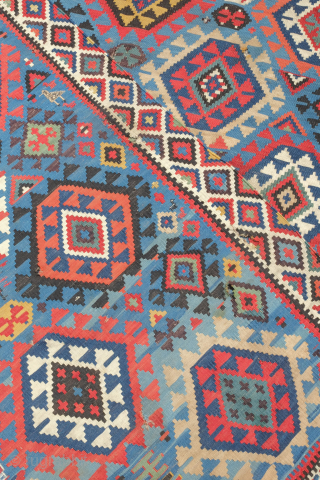 Shirvan kilim, 19th century in smaller format.  Rare border type. Paper thin weave. Animal figures in soumak weave throughout the bottom half of the kilim. It has a couple of holes  ...