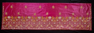 Edirne Bed Valance, 19th Century.  Silk and metallic chain stitch on a silk ground cloth. The design is in a symmetrical floral arrangement reminiscent of Mughal floral designs. The backing is  ...