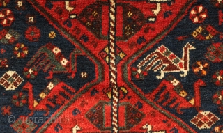 Shiraz area small rug, Late 19th or early 20th century.  Thick, lush pile.  Excellent condition.  Original selvedges. Atypical size.  Wonderful bird motifs scattered about. 
83 x 123 cm 