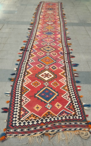 Qashqa'i runner kilim, late 19th to early 20th century.  All or mostly natural dyes.  Wool tufts along the edges suggesting a dowry piece.  In great condition.  It was  ...