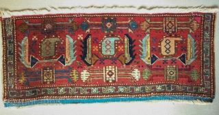 Heriz-Karadagh mafrash panel, 19th century.  Excellent colors.  Serrated leaf or mahi motifs flanking botehs.  A small repair on the top right corner. 112 x 48 cm.    