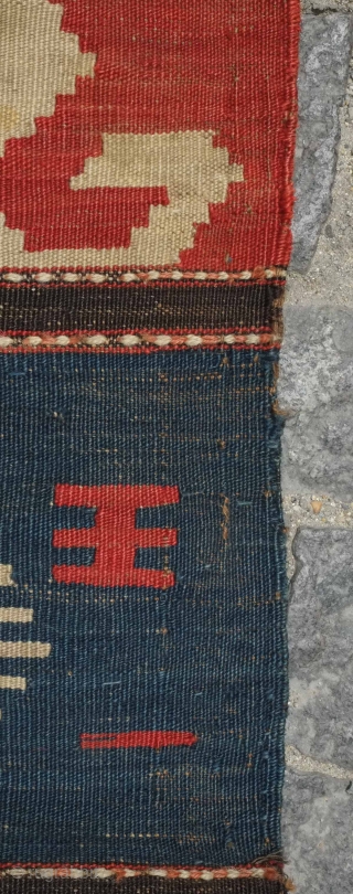 Borchalo Kazak kilim, 19th century.  Wide bands.  Fingered medallions.  Good age and colors. A hole at the top which can easly be repaired.  176 x 209 cm   ...