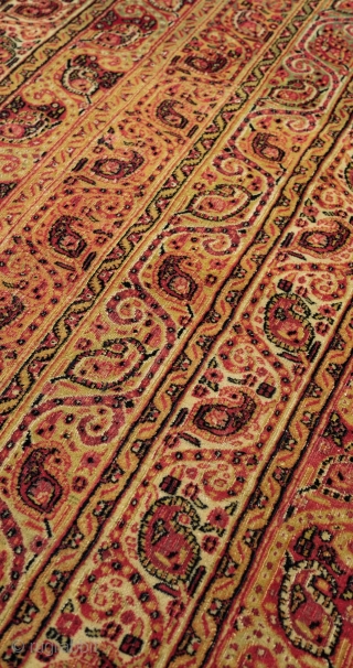 Mashhad Carpet, 3rd quarter of the 19th century. Kashmir shawl striped design.  Very fine weave. Mellow, subtle colors with a wonderful soft green.  156 x 267 cm.    