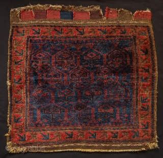 Baluch Saddle Bag Face, Khorasan, Late 19th Century.  Rich, deep dark field with Seljuk-like floral motifs.  All good colors and very soft, silk wool with great shine. 63 x 61  ...