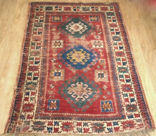 Borchalo Kazak rug. First half of 19th century. A wonderful, simple repeated 2:1:2 design scheme. Some definite wear and some old repairs but it is still very much alive. 154 x 230  ...