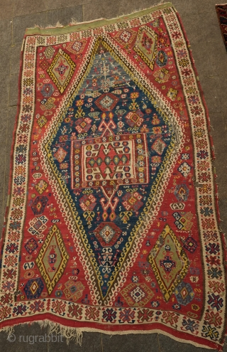 Central Anatolian Kilim, mid-19th century.  A blitz of colors.  Strongly archaic designs.  Very ethnographic and filled with portent. Rare type. 183 x 310 cm.      