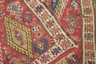 Central Anatolian Kilim, mid-19th century.  A blitz of colors.  Strongly archaic designs.  Very ethnographic and filled with portent. Rare type. 183 x 310 cm.      