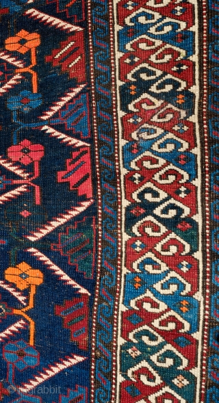 Shirvan or Kuba Rug, Late 19th Century. Blue ground with two shades of blue in a lattice and very minimized Afshan design.  The border is in a compound split leaf border.  ...