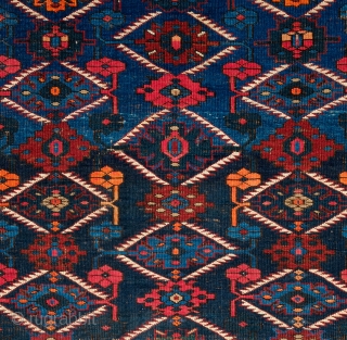 Shirvan or Kuba Rug, Late 19th Century. Blue ground with two shades of blue in a lattice and very minimized Afshan design.  The border is in a compound split leaf border.  ...