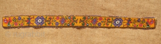 Sivas area glass beaded belt from the 1920s to 1930s. Yellow ground. Beautifully articulated floral motifs, Turkmen gol-like medallions and a rooster on each end.  Leather backing.  5.5 x 74  ...