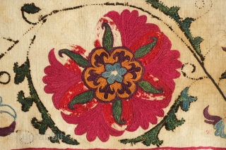 Uzbek suzani border fragment, 3rd to 4th quarter of the 19th century.  A few of the inner petals are in wool some of which has corroded due to a corrosive quality  ...