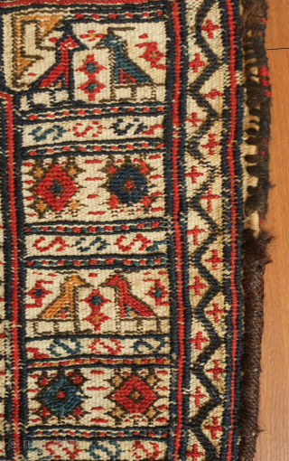 A Lori-Bakhtiyari small saddle bag, 19th century.  This bag is in an unusual side and diplays bird figures in an arrangement slightly resembling kufic borders seen on Seljuk and other old  ...