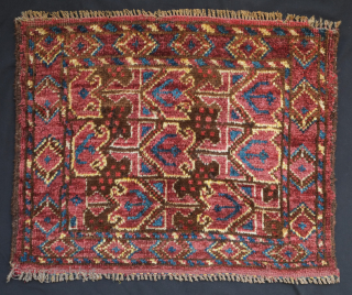 Beshir saddle bag face, 19th century. The wool is silky soft and the the colors rich with a shiny salmon-pink red. The pile is full and the feel is floppy. 54 x  ...