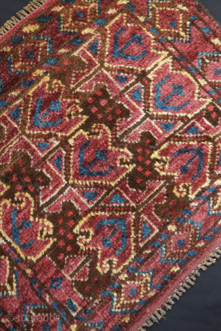 Beshir saddle bag face, 19th century. The wool is silky soft and the the colors rich with a shiny salmon-pink red. The pile is full and the feel is floppy. 54 x  ...