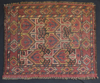 Beshir saddle bag face, 19th century. The wool is silky soft and the the colors rich with a shiny salmon-pink red. The pile is full and the feel is floppy. 54 x  ...