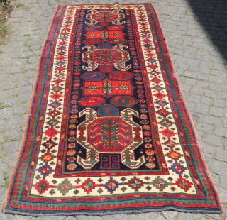 Lenkoran-Talish long rug, 19th century. Full pile with some corrosion in the blacks.  A small touch of repiling in a couple of spots on the right hand border.   112  ...