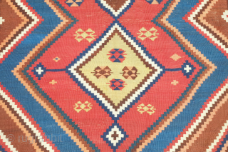 Qashqa'i Kilim, 19th century.  It has a zigzag field design and is in a fine weave. All good colors including a light pistachio green, apricot and a rich brown. Overall good  ...