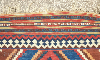 Qashqa'i Kilim, 19th century.  It has a zigzag field design and is in a fine weave. All good colors including a light pistachio green, apricot and a rich brown. Overall good  ...