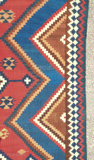 Qashqa'i Kilim, 19th century.  It has a zigzag field design and is in a fine weave. All good colors including a light pistachio green, apricot and a rich brown. Overall good  ...
