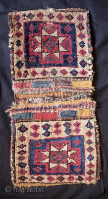 Shahsavan Kurdish group small pile saddle bag, 3rd to 4th quarter of the 19th century.  Nicely spaced white border dotted with small diamonds.  Centrally placed single 8-pointed star.  The  ...