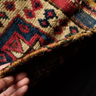 Shahsavan Kurdish group small pile saddle bag, 3rd to 4th quarter of the 19th century.  Nicely spaced white border dotted with small diamonds.  Centrally placed single 8-pointed star.  The  ...