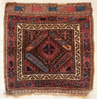 Baluch Bag Face, possibly Maldari, late 19th centurty.  This wonderful beauty has soft wool and uncommon colors.  It has a beautiful green, yellow and aqua blue in the bars surrounding  ...