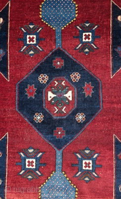 Kazak, Early 1900s.  Wonderful colors and some abrash on the bottom end.  Good pile. A beautiful decorative rug.  144 x 231 cm.        