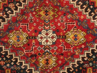 Qashqa'i bag face, possibly Kashkuli, 19th century.  Very fine weave.  Purple silk wefts. Mounted on linen. 58 x 58 cm, linen 81 x 81 cm      