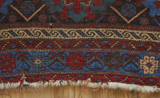 Afshar rug, 19th century. Large florals in an electric blue and deep green on a black ground. Pile is low with corrosion in the black but it is all there. ...