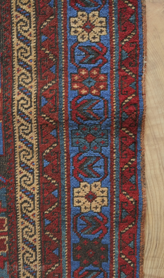 Afshar rug, 19th century. Large florals in an electric blue and deep green on a black ground. Pile is low with corrosion in the black but it is all there. ...