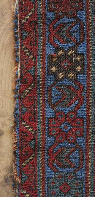Afshar rug, 19th century. Large florals in an electric blue and deep green on a black ground. Pile is low with corrosion in the black but it is all there. ...