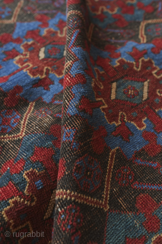 Afshar rug, 19th century. Large florals in an electric blue and deep green on a black ground. Pile is low with corrosion in the black but it is all there. ...