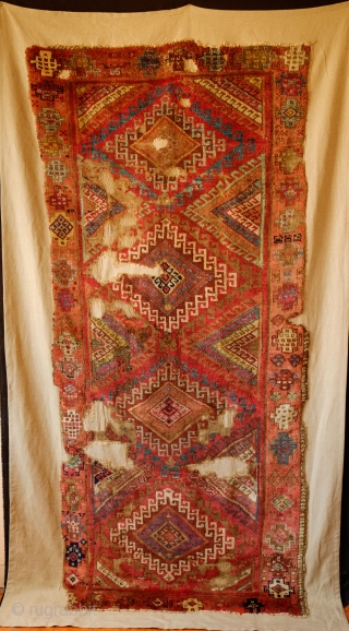 Adiyaman Kurdish Rug, 1820-40s.  The incredible border is in a myriad of variations of Memling gul motifs.  The back of the rug has a flattened look which suggests its age.  ...