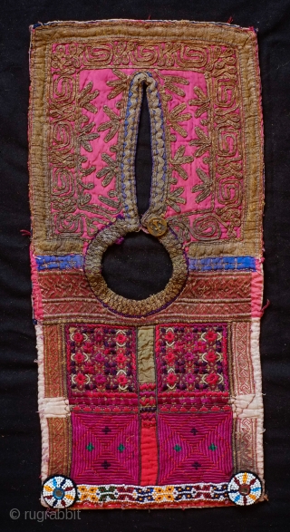 Pashtun Mangal, Paktika Child's Vest (I believe), Late 19th Century.  Cotton base material with green and red silk face.  Silk embroidery on the back side with a bead band on  ...