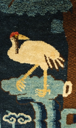 Pao Tao Rug, C. 1900 or so.  Very soft wool.  Two crane figures symbolizing longevity. Wonderful fleur de lis-like motifs for the inner border.  The cloud at the top  ...