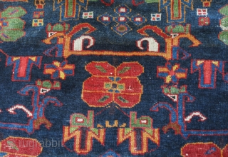 Bakhtiyari Rug, fourth quarter of the 19th century.  Extraordinary colors and floral and abstracted animal motifs. Very striking border.  Some condition issues but most of the pile is decent with  ...