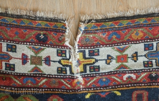 Bakhtiyari Rug, fourth quarter of the 19th century.  Extraordinary colors and floral and abstracted animal motifs. Very striking border.  Some condition issues but most of the pile is decent with  ...