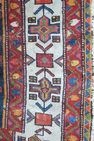 Bakhtiyari Rug, fourth quarter of the 19th century.  Extraordinary colors and floral and abstracted animal motifs. Very striking border.  Some condition issues but most of the pile is decent with  ...