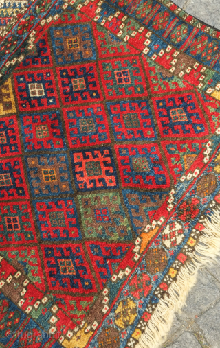 Jaff bag face, 19th century. Fantastic saturated colors. Striking touches that keep the eye interested like the yellow triangle coming down into the field. Great condition.  85 x 69 cm  